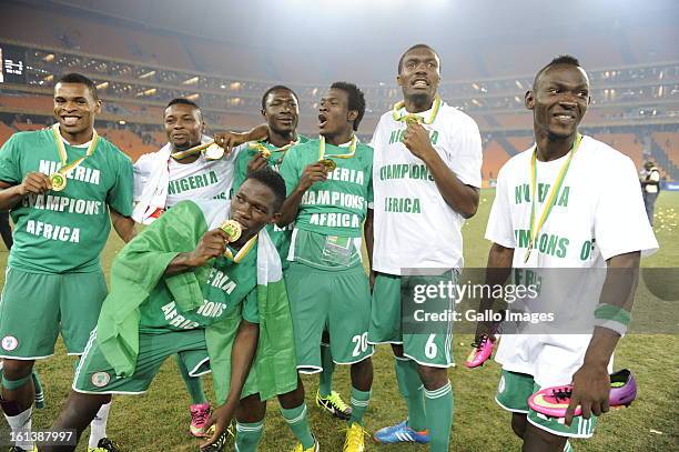Nigerian players celebrates holding the trophy during the 2013 Orange African Cup of Nations Final match between Nigeria and Burkina Faso from the...