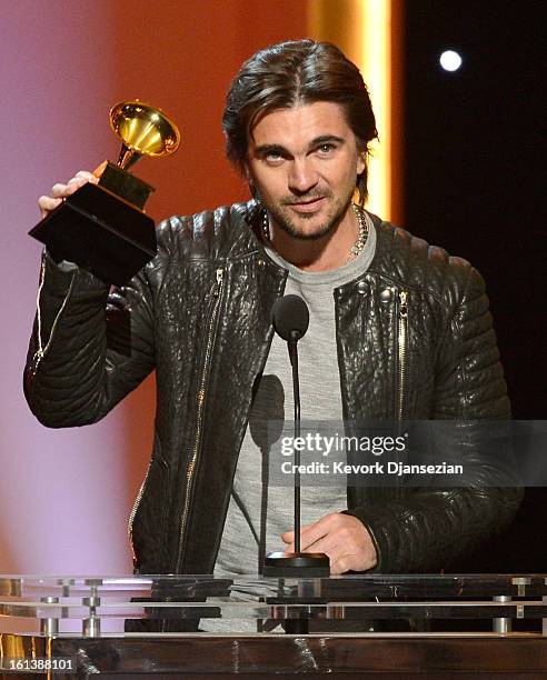 Singer Juanes accepts Best Latin Pop Album for "MTV Unplugged: Deluxe Edition" onstage at the The 55th Annual GRAMMY Awards at Nokia Theatre on...