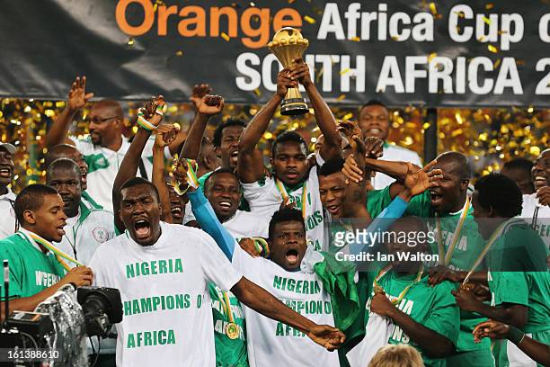 Joseph Yobo and team mates celebrate with the trophy after winning the 2013 Africa Cup of Nations Final match between Nigeria and Burkina at FNB...