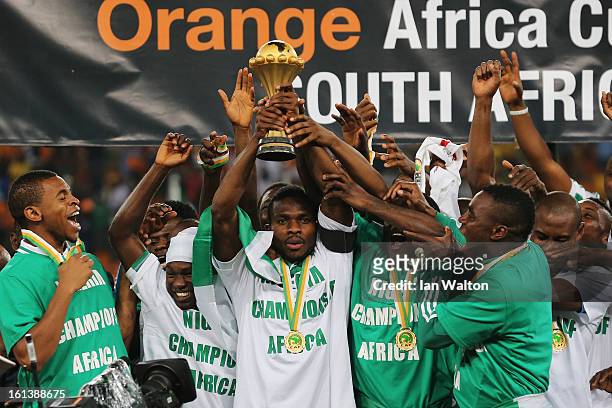 Joseph Yobo and team mates celebrate with the trophy after winning the 2013 Africa Cup of Nations Final match between Nigeria and Burkina at FNB...