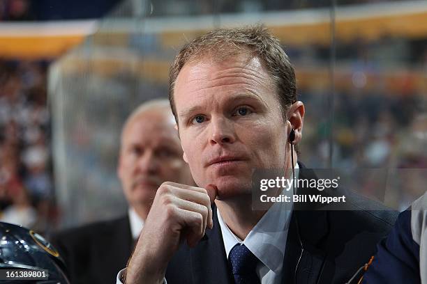 Assistant coach Kevyn Adams of the Buffalo Sabres watches their game against the Montreal Canadiens on February 7, 2013 at the First Niagara Center...