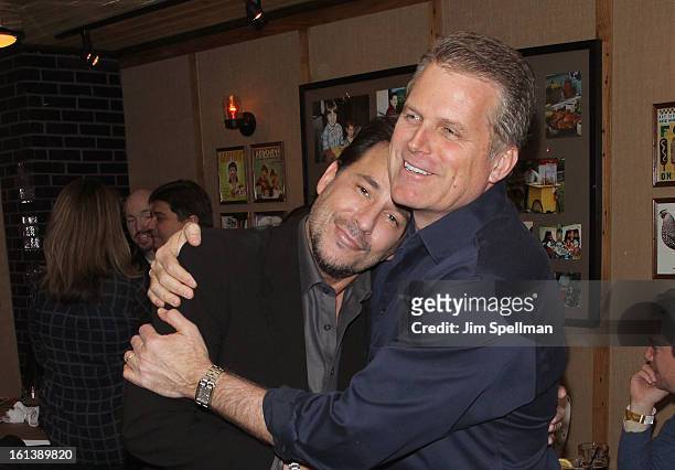 Actors Ricky Paull Goldin and Robert Newman attend the "Spontaneous Construction" premiere at Guy?s American Kitchen & Bar on February 10, 2013 in...