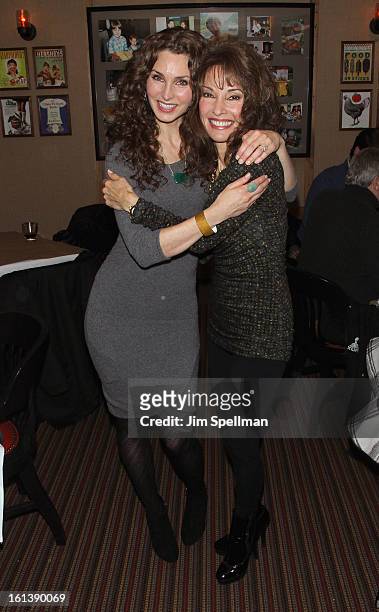 Actors Alicia Minshew and Susan Lucci attend the "Spontaneous Construction" premiere at Guy?s American Kitchen & Bar on February 10, 2013 in New York...