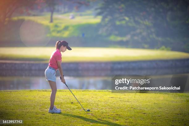 golf day - golf ball water stock pictures, royalty-free photos & images