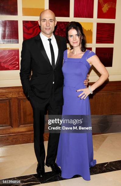 Mark Strong and Liza Marshall arrive at the after party following the EE British Academy Film Awards at Grosvenor House on February 10, 2013 in...