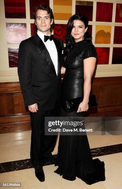 Henry Cavill and Gina Carano arrive at the after party following the EE British Academy Film Awards at Grosvenor House on February 10, 2013 in...