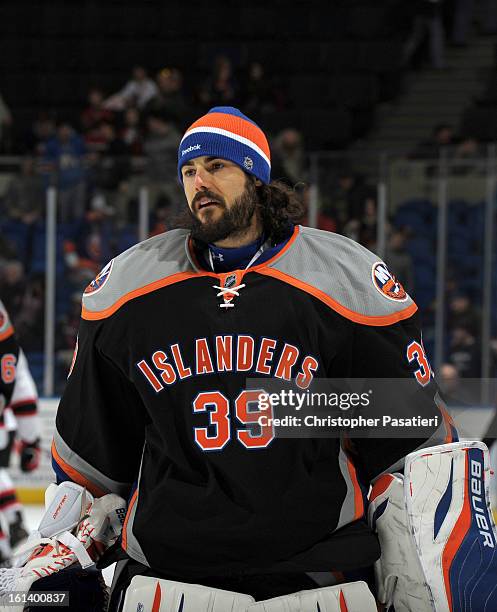 Rick DiPietro of the New York Islanders skates off the ice after the game against the New Jersey Devils on February 3, 2013 at Nassau Veterans...