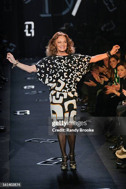 Diane Von Furstenberg greets the audience after her Fall 2013 fashion show during Mercedes-Benz Fashion Week at The Theatre at Lincoln Center on...