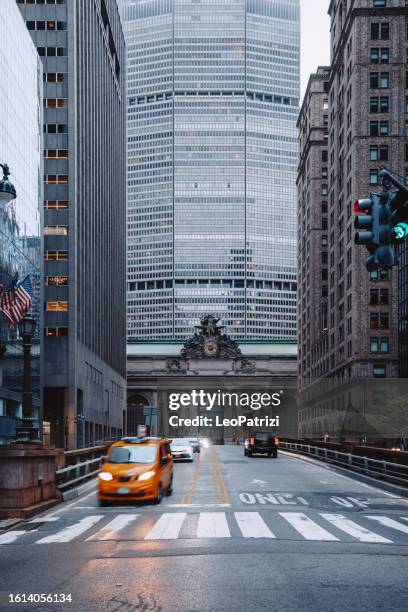 yellow taxi in new york grand central terminal - yellow taxi stock pictures, royalty-free photos & images