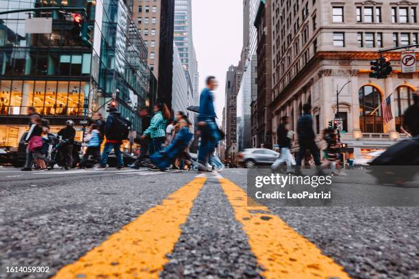 crowded new york city streets in manhattan - ny stock pictures, royalty-free photos & images