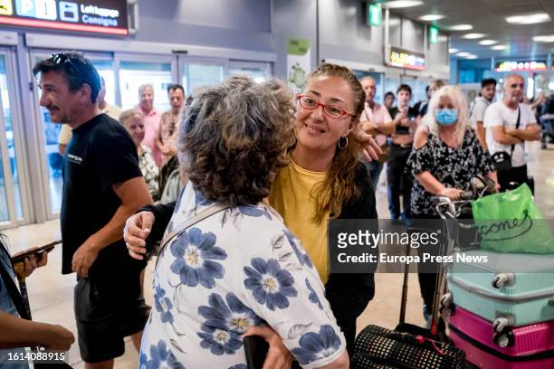Relatives welcome one of the tourists trapped in Ethiopia at the Adolfo Suarez Madrid-Barajas airport, on 14 August, 2023 in Madrid, Spain. The 19...