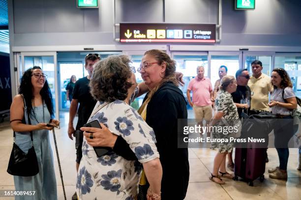 Relatives welcome one of the tourists trapped in Ethiopia at the Adolfo Suarez Madrid-Barajas airport, on 14 August, 2023 in Madrid, Spain. The 19...