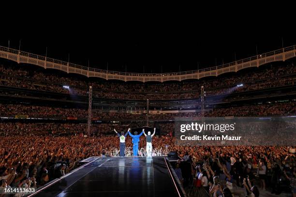 Kevin Jonas, Joe Jonas, and Nick Jonas perform onstage during Jonas Brothers “Five Albums, One Night” Tour - New York at Yankee Stadium on August 13,...