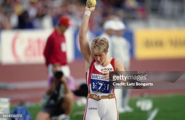 German athlete Astrid Kumbernuss competes in the women's shot put event of the 1994 European Athletics Championships, held at the Helsinki Olympic...