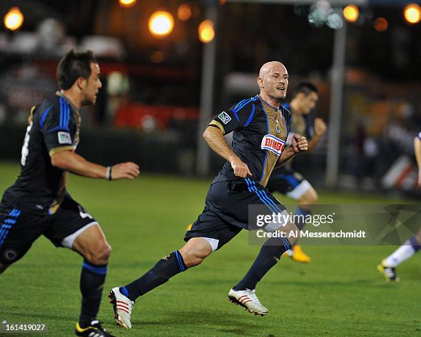 Forward Conor Casey of the Philadelphia Union runs upfield against Orlando City February 9, 2013 in the first round of the Disney Pro Soccer Classic...