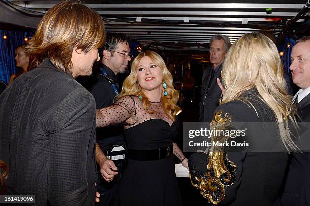 Singers Keith Urban and Kelly Clarkson, and actress Kaley Cuoco attend the 55th Annual GRAMMY Awards at STAPLES Center on February 10, 2013 in Los...