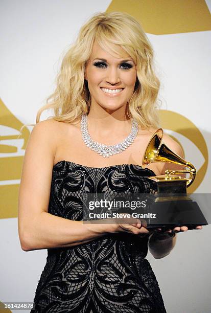Singer Carrie Underwood poses in the press room during the 55th Annual GRAMMY Awards at STAPLES Center on February 10, 2013 in Los Angeles,...