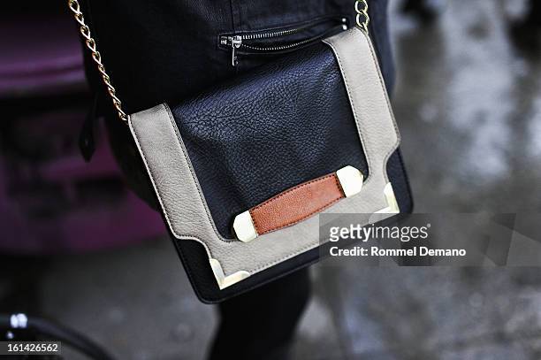 Emily Mercer seen outside the Y-3 show wearing Danielle Nicole bag on February 10, 2013 in New York City.