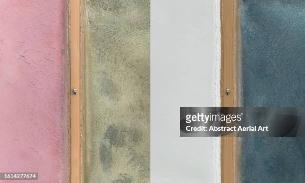 two drone images photographed two months apart and layered side by side which shows the difference in colour of lake macdonnell as salinity and algae levels change over time, penong, south australia, australia - side by side comparison stock pictures, royalty-free photos & images