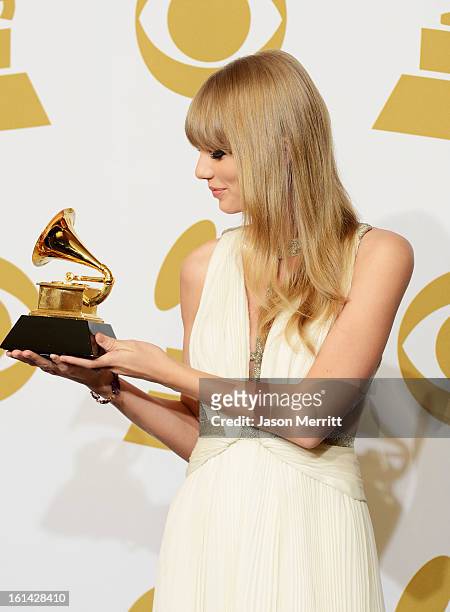 Singer/Musician Taylor Swift, winner of Best Song Written For Visual Media, poses in the press room at the 55th Annual GRAMMY Awards at Staples...