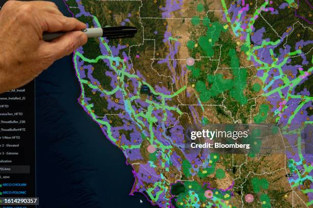 Monitor displaying color-coded areas of concern at PG&E Corp.'s Hazard Awareness Warning Center in San Ramon, California, US, on Wednesday, June 28,...