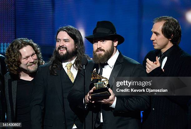 Musicians Coy Bowles, Clay Cook, Zac Brown and Jimmy Martini of Zac Brown Band accept Best Country Album award for "Uncaged" onstage at the 55th...