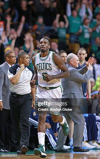 The Celtics Jeff Green brings both the crowd and Nuggets head coach George Karl out of their seats, the crowd cheering, and the coach calling a...