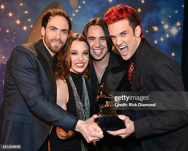 Musicians Josh Smith, Lzzy Hale, Joe Hottinger, and Arejay Hale of the band Halestorm pose onstage during the 55th Annual GRAMMY Awards Pre-Telecast...
