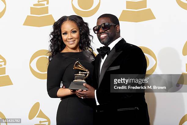 Erica Campbell and Warryn Campbell, winners of Best Gospel Song for 'Go Get It,' pose in the press room at the 55th Annual GRAMMY Awards at Staples...