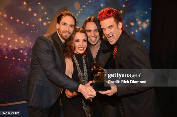 Musicians Josh Smith, Lzzy Hale, Joe Hottinger, and Arejay Hale of the band Halestorm pose onstage during the 55th Annual GRAMMY Awards Pre-Telecast...