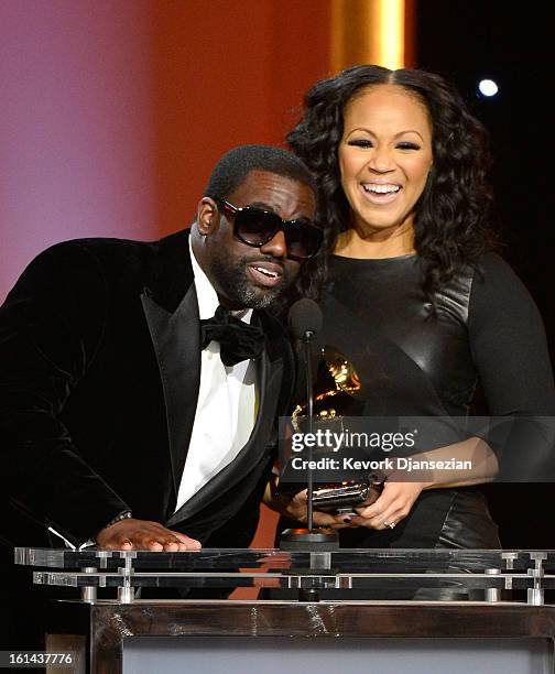 Producer Warryn Campbell and singer Erica Campbell of Mary Mary accept Best Gospel Song award for "Go Get It" onstage at the The 55th Annual GRAMMY...