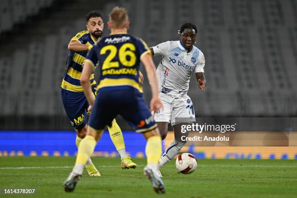 Uros Radakovic of MKE Ankaragucu in action against Babajide David Akintola of Yukatel Adana Demirspor during the Turkish Super Lig week 2 match...