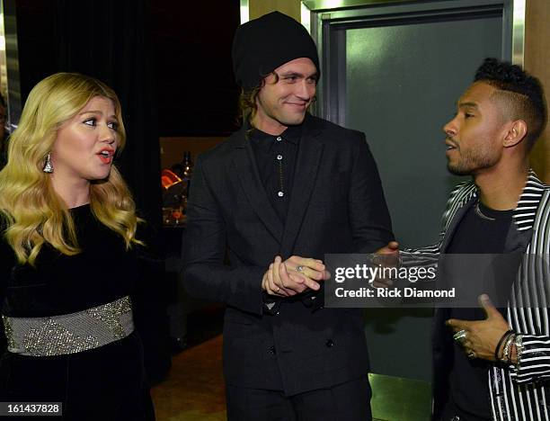 Singers Kelly Clarkson, Mikky Ekko and Miguel attend the 55th Annual GRAMMY Awards at STAPLES Center on February 10, 2013 in Los Angeles, California.