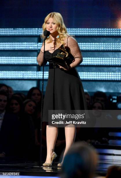 Singer Kelly Clarkson accepts an award onstage at the 55th Annual GRAMMY Awards at Staples Center on February 10, 2013 in Los Angeles, California.