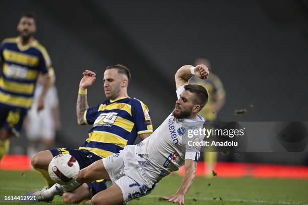 Uros Radakovic of MKE Ankaragucu in action against Kevin Manuel Rodrigues of Yukatel Adana Demirspor during the Turkish Super Lig week 2 match...