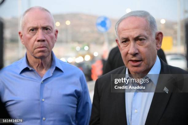 Israeli Prime Minister Benjamin Netanyahu and Israeli Defense Minister Yoav Gallant visit the site of the shooting where a settler was killed and...