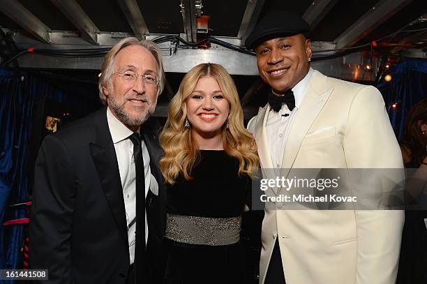 President/CEO of The Recording Academy Neil Portnow, singer Kelly Clarkson, and host LL Cool J, attend the 55th Annual GRAMMY Awards at STAPLES...