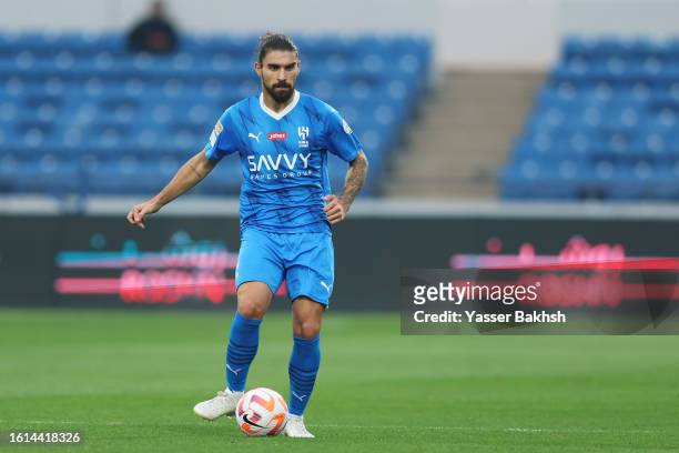 Ruben Neves of Al-Hilal passes the ball during the Saudi Pro League match between Abha and Al-Hilal at Prince Sultan Bin Abdulaziz Sport City on...