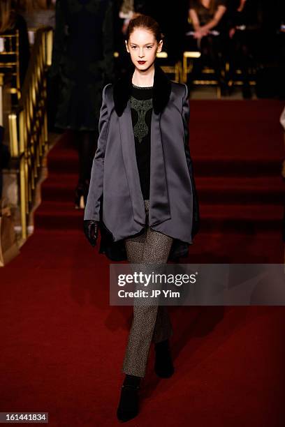 Model walks the runway at the Zac Posen Fall 2013 fashion show during Mercedes-Benz Fashion Week at The Plaza Hotel on February 10, 2013 in New York...