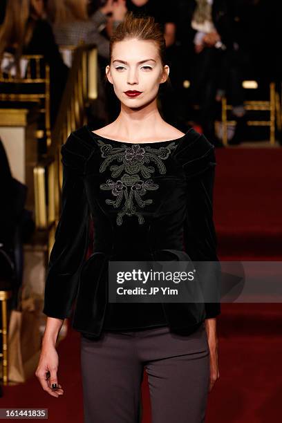 Model walks the runway at the Zac Posen Fall 2013 fashion show during Mercedes-Benz Fashion Week at The Plaza Hotel on February 10, 2013 in New York...