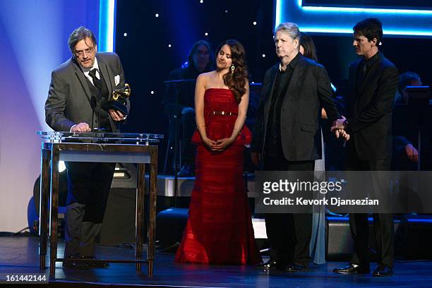 Presenter Britt Nicole looks on as Compilation Producer Mark Linett, musician Brian Wilson and Compilation Producer Dennis Wolfe accept Best...