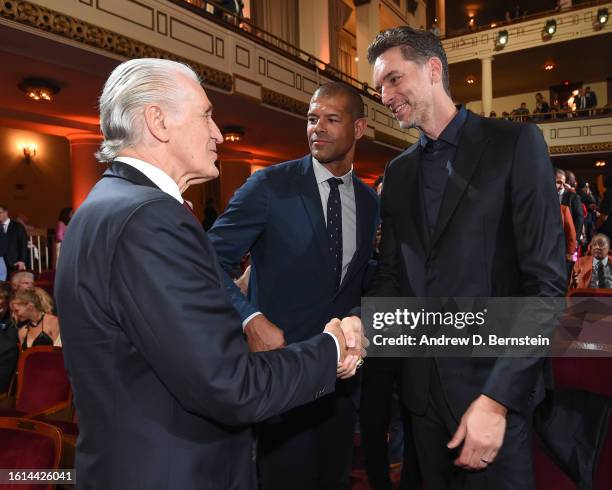 Pat Riley & Pau Gasol embrace during the 2023 Basketball Hall of Fame Enshrinement Ceremony on August 12, 2023 at Springfield Marriott in...