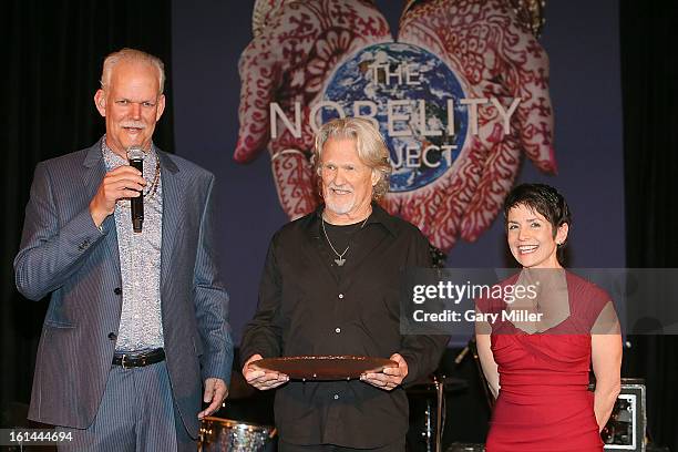 Turk Pipkin, Kris Kristofferson and Christy Pipkin onstage during the Nobelity Projects Artists and Filmmakers Dinner honoring Kris Kristofferson...