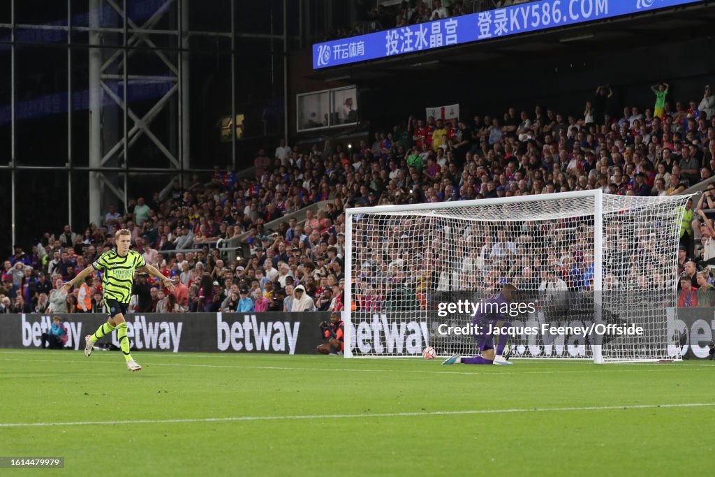 Martin Odegaard of Arsenal celebrates after scoring the opening