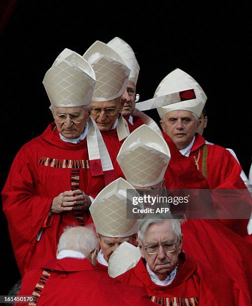 Picture taken 08 April 2005 during the funeral ceremony of Pope John Paul II shows German Cardinal Joseph Ratzinger and other Cardinals entering St...