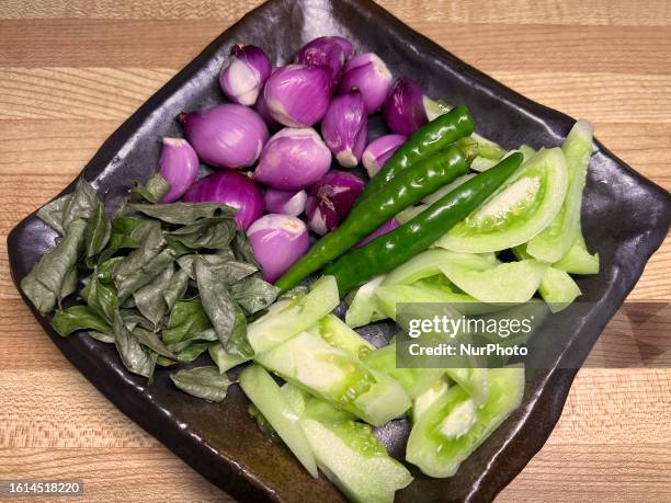 Vegetables to be used while preparing Netholi Meen Peera in Toronto, Ontario, Canada, on August 17, 2023.