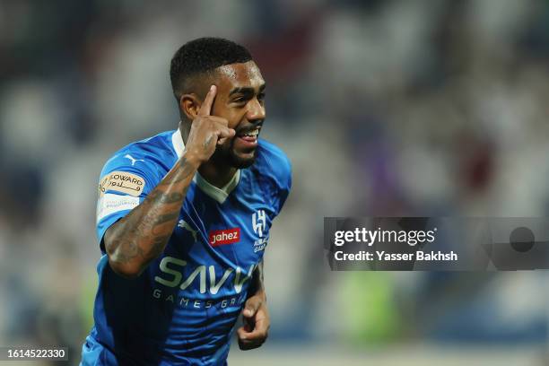 Malcom of Al Hilal celebrates after scoring the team's second goal during the Saudi Pro League match between Abha and Al-Hilal at Prince Sultan Bin...