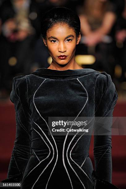 Model walks the runway at the Zac Posen Autumn Winter 2013 fashion show during New York Fashion Week on February 10, 2013 in New York, United States.