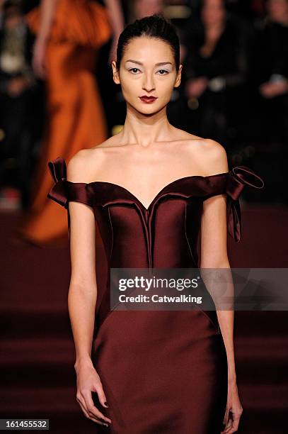 Model walks the runway at the Zac Posen Autumn Winter 2013 fashion show during New York Fashion Week on February 10, 2013 in New York, United States.