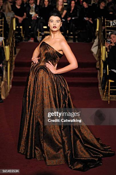 Model walks the runway at the Zac Posen Autumn Winter 2013 fashion show during New York Fashion Week on February 10, 2013 in New York, United States.